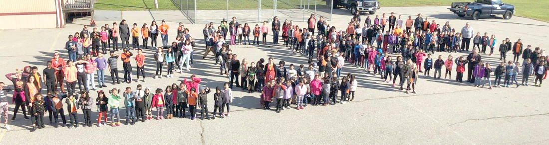 ARLINGTON’S ANNUAL TRADITION: In what’s become an annual tradition, the entire student body, faculty and staff at Arlington Elementary School formed this year’s photo, “2018” in honor of Cranston’s 2018 Go Orange food and fundraiser. The photo was taken from the roof of the school.